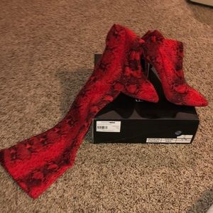 Red snakeskin print boots
